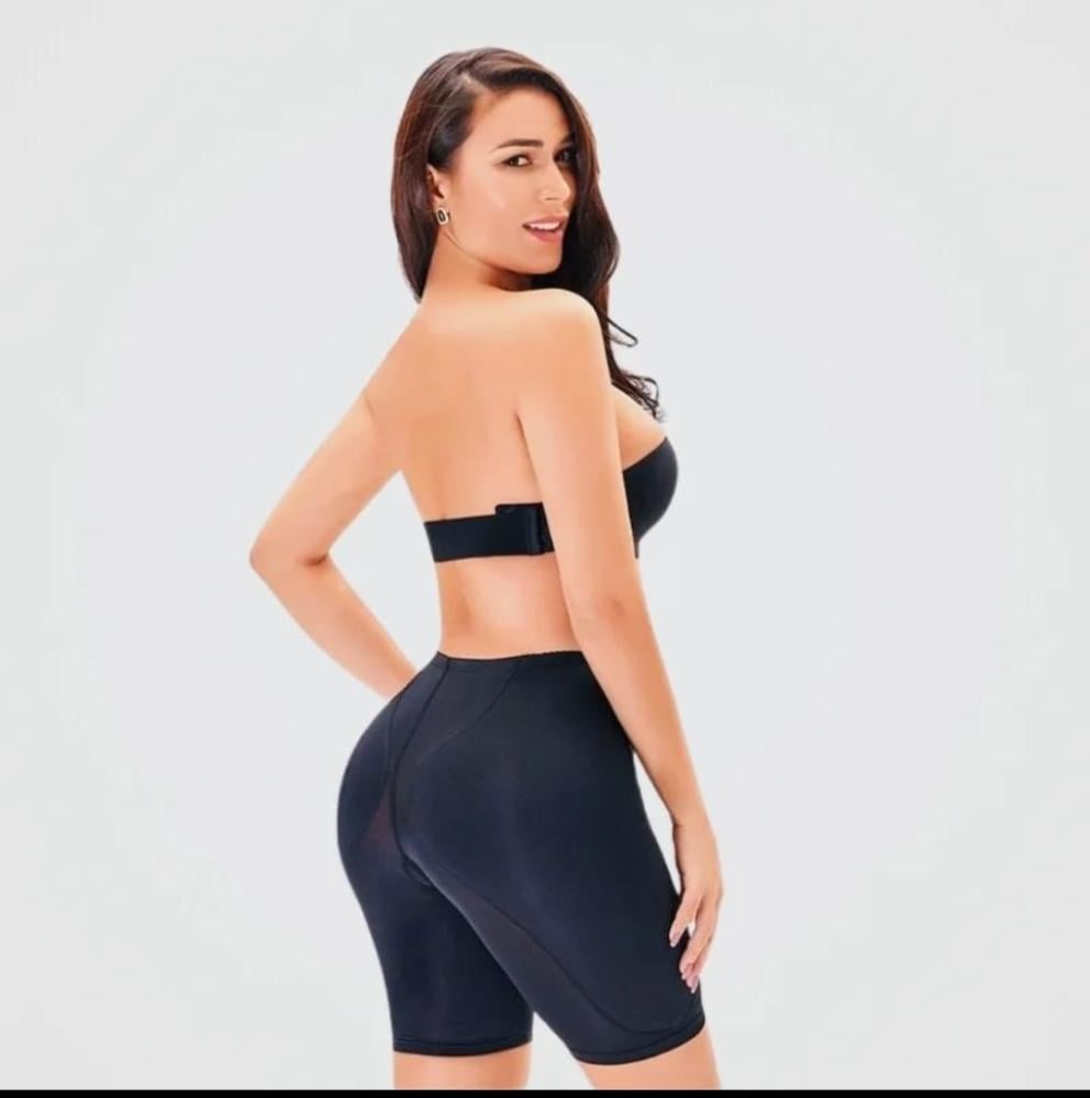 Black shorts to hide the bulge and enlarge the thighs