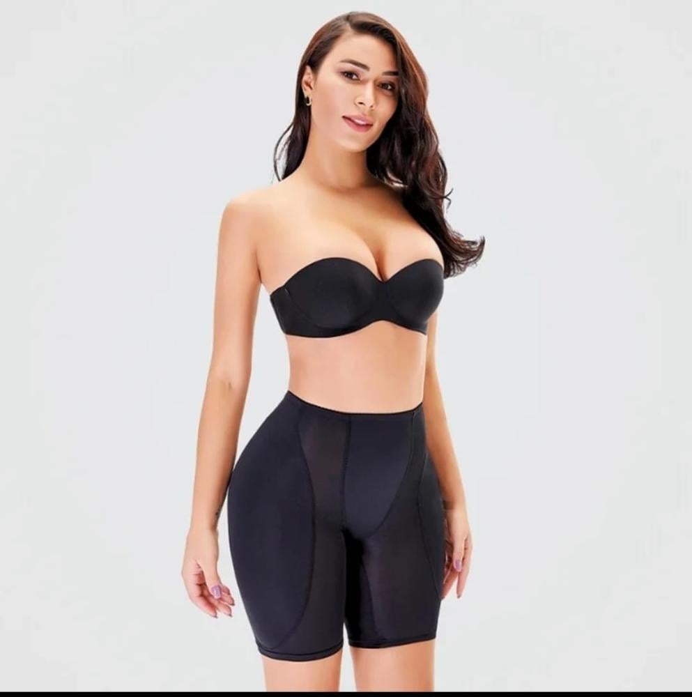 Black shorts to hide the bulge and enlarge the thighs