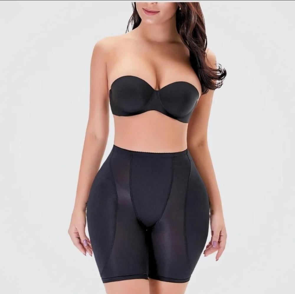 Black shorts to hide the bulge and enlarge the thighs